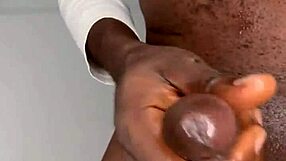 Ninja man strokes his monster cock and cums hard on himself.