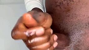 Ninja man strokes his monster cock and cums hard on himself.