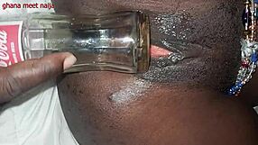 Playing With Ebony Pussy And Fucking It With Coca Cola Bottle