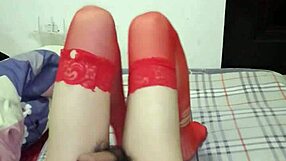 Ladyboy Yiyi Strokes to Intense Orgasm in Silk Stockings