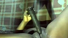 playing with my wet pussy using a dildo