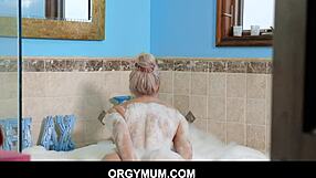 Blonde MILF stepmom caught son accessing her big tits