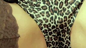 Brunette milf mom fingers her shaved pussy on bed