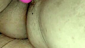 Mature woman bends over for dildo masturbation