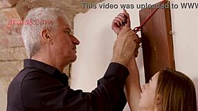 watch this captured babe's big boobs get tormented!