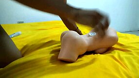 The guy has a rough sex with a doll with a big dick