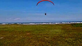 Priscila Belini, the skinny latina teen, strips naked and masturbates on a paramotor in public.