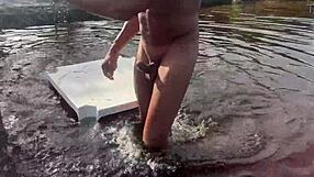 Who is fucking in the middle of the lake with the hot brunette?