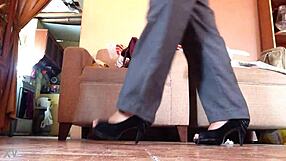 Shemale struts powerfully in black high heels