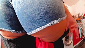 Curvy babe teases in sizzling hot shorts showing off her big ass