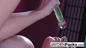 Is Jayden Jaymes teasing her big tits on that oily wall?