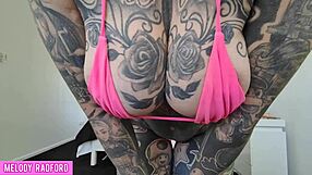 cheeky milf mommy tries on bikinis, showing off mature tattooed body with big ass and fake tits homemade