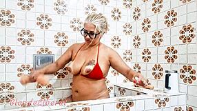 Is She Inserting Dildo In Pussy Or Just Flashing In Bathroom?