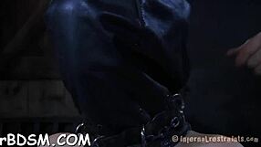 Bounded chick endures shocking prod on tits and hairless vagina in bdsm play