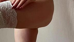 watch this innocent girl strip out of her stockings and lingerie for you