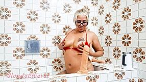 Is She Inserting Dildo In Pussy Or Just Flashing In Bathroom?