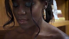 Ebony teen cooks and strips seductively.