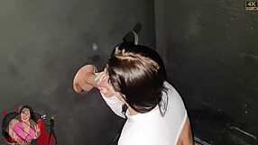 Sucking two big cocks in gloryhole