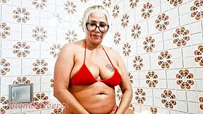 Is She Inserting Dildo In Pussy Or Just Flashing In Bathroom?