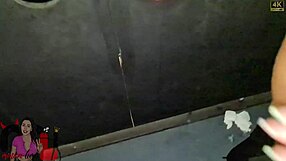 Sucking two big cocks in gloryhole