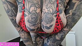 cheeky milf mommy tries on bikinis, showing off mature tattooed body with big ass and fake tits homemade