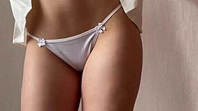 watch this innocent girl strip out of her stockings and lingerie for you