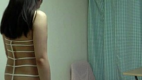 Japanese girl changes from mini dress and thong into micro bikini