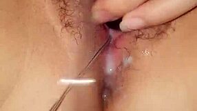 Asian Babe Toys Herself To Squirt?