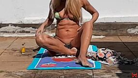 Hot blonde runs naked in yard.