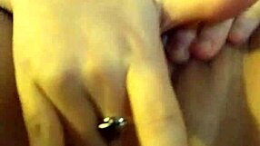 she plays with her wet pussy, fingering herself while watching friends' porno