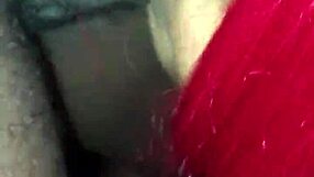 Sloppy ebony redhead receives wet cumshot on her black hood.