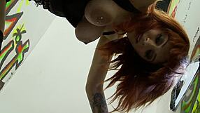 I watch the hot red milf suck a monster cock at the gloryhole