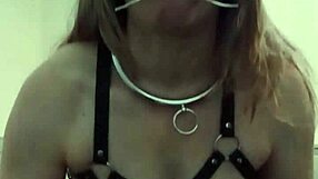 female slave in harness with candle