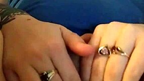 she plays with her wet pussy, fingering herself while watching friends' porno