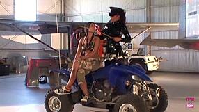 Two brunettes fuck with strapon in warehouse