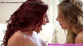 The redhead fingered and clit-rubbed the small-titted babe passionately