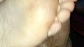 This homemade session features a bare footjob ending in a big cumshot.