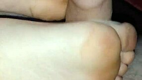 This homemade session features a bare footjob ending in a big cumshot.