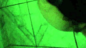 the seductive prostitute gives an intense blowjob in the dimly lit room, her lips wrapped tightly around the throbbing cock