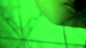 the seductive prostitute gives an intense blowjob in the dimly lit room, her lips wrapped tightly around the throbbing cock