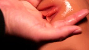 I practice picking a woman's pussy with toys close up