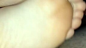 This homemade session features a bare footjob ending in a big cumshot.