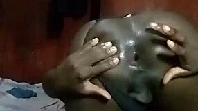 Horny Kenyan crossdresser strips and fingers his gaping asshole