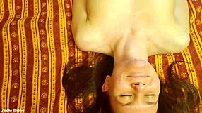 Couple enjoys a relaxing olive oil massage in the bedroom