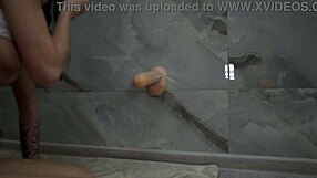 tattooed brunette cutie sucks a lollipop, rides a dildo, and fucks herself to a powerful orgasm