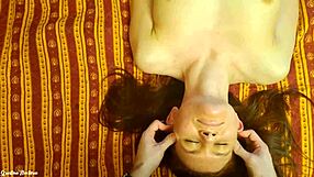 Couple enjoys a relaxing olive oil massage in the bedroom