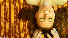 Couple enjoys a relaxing olive oil massage in the bedroom