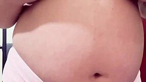 Pregnant Arab step mother boldly teases and strips nude on webcam, craving a hard fuck for her hairy pussy