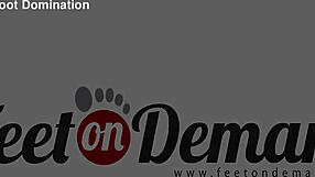 Roxanne's caged slave teases with stocking feet in femdom play