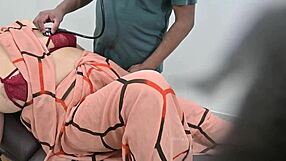 indian doctor checking lady patient in clinic